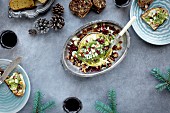 Baked Camembert with Gorgonzola Hazelnut Pesto served with red wine and crackers