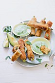 French toast roll-ups with ham, asparagus and avocado and rocket dip