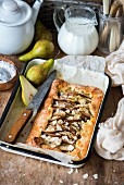 A pear pie with flaked almonds