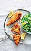 Cod in a crispy batter with endive and sugar snap salad