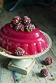 Flavored raspberry jelly on a vintage porcelain stand