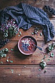 Chocolate smoothie bowl with Brazil nuts, goji berries and cacao nibs
