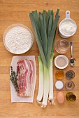 Ingredients for a sour cream flan with leeks and bacon