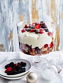 Berry trifle with sponge cake and whipped cream