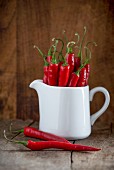 Fresh red chillies in a pitcher