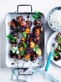 Soy-glazed pork and pineapple skewers