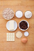 Ingredients for cereal cookies with raisins and white chocolate
