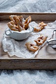 Fried vegan pastries with icing sugar