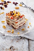 Colourful pieces of cake with dried fruits and nuts