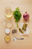 Ingredients for onion vinaigrette with gherkins