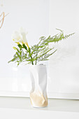 Gold and white vase hand-made from crumpled can