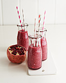 Bottles of pomegranate smoothies