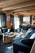 View from living area with zebra-skin rug into dining area