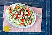 Couscous and zucchini salad with strawberries and blue cheese