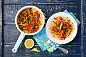 Spaghetti with tomato sauce, celery and sprats