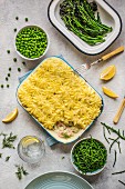 Fish pie with vegetable side dishes