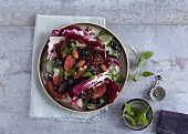 A detox salad with quinoa, pink grapefruit and blueberries