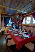 Elegantly set, Alpine-style Christmas dining table
