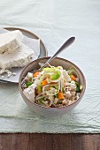 Light vegetable rice with shoots and feta