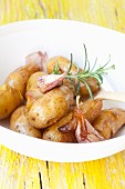 Potatoes boiled in their skins with garlic and rosemary