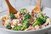 Salad with broccoli, cauliflower, bacon, cheese and a yogurt dressing