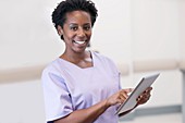 Woman nurse using tablet