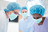 Female surgeons in operating theatre