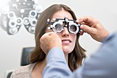Woman having eye test