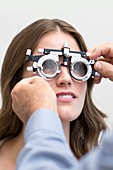 Woman having eye test