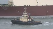Tugboat and LNG tanker