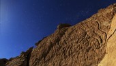 Atacama llama rock art in moonlight, time-lapse footage