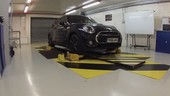 Mini car having its suspension tested