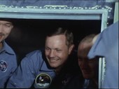 Quarantined Apollo 11 crew greet families, July 1969