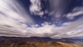 Clouds at night over Andean mountains, time-lapse footage