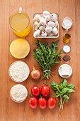 Ingredients for polenta gratin with mushrooms and rocket