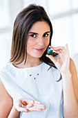 Woman holding stones used for crystal healing