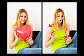 Woman holding heart-shaped balloons