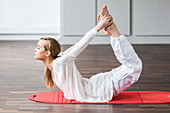 Woman practicing stretching exercises