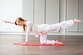 Woman practicing stretching exercises