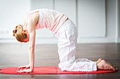 Woman practicing stretching exercises