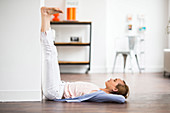 Woman practicing stretching exercises