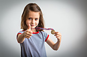 Girl wearing a medal