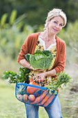 Woman with vegetables basket