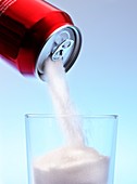 Sugar pouring from a soft drink can