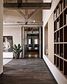 Custom-made, fitted shelving in loft-apartment interior