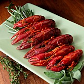 Boiled crayfish with herbs on a serving platter