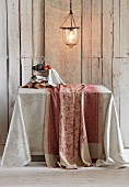 Paisley table linen against of rustic board wall