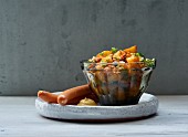 Spicy potato salad with bock sausages