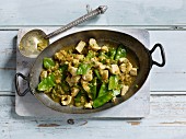 Indian chicken curry with sugar snap peas and ginger