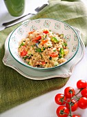 Quinoa with tomato, red bell pepper, green bell pepper, fresh Pachino tomatoes and fresh mint and italian extra virgin olive oil, Italy